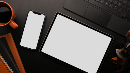 graphic tablet mockup, smartphone mockup, keyboard laptop and accessories on black background