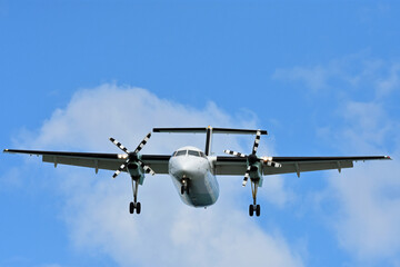 Propeller airplane in for landing