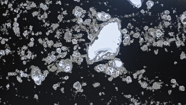 Floes in winter river. Aerial view on nature in winter.