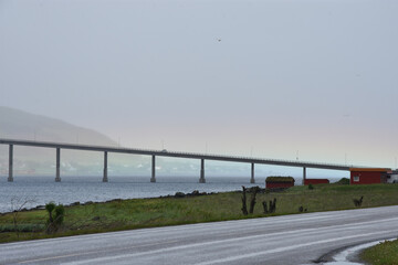Bridge in foggy air with rainbow shimmer