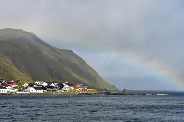 Rainbow over coastal settlement in the high north