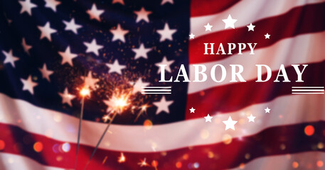 Hands holding Sparklers on background United States national flag with text Happy Labor Day. USA...