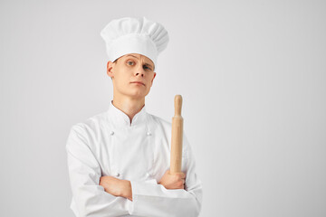 man chef rolling pin in hands emotions self-confidence kitchen