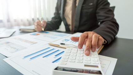business audits using a calculator financial data investment fund, wealth concept