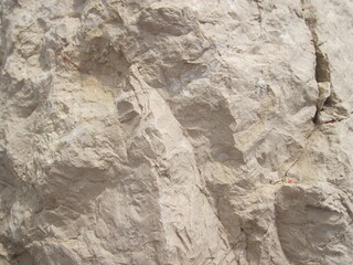 Textured stone wall. Natural stone background. Rock texture backgrounds close up.