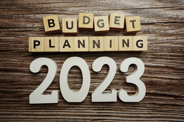 Budget Planning 2023 alphabet letters on wooden background