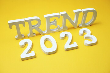 Trend 2023 alphabet letter on yellow background