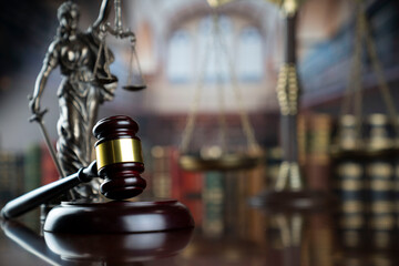Law and justice concept. Law symbols composition: judge’s gavel, Themis  statue and scale.