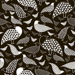 Seamless pattern with black and white birds in doodle style
