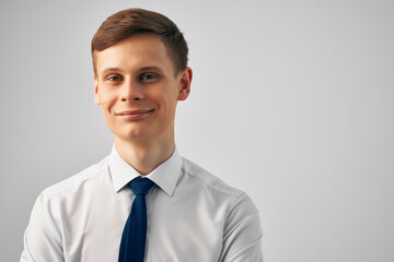 handsome man in shirt with tie posing office manager