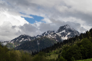 alpine mountains and clouds landscape background