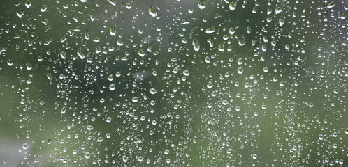 Naklejka na ściany i meble Raindrops on the window. Close up