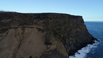 Cliffs by Reynisfjara black beach in Iceland