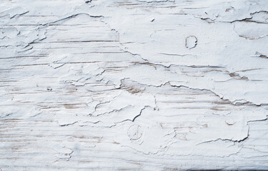 Grunge peeling white paint wood texture.
