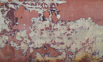 Old, aged, deteriorated, multicolor facade