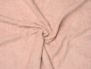 Fototapeta premium Pink twisted terry towel, hygiene item