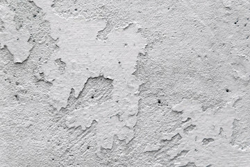 Closeup White grey cement house distressed wall or ceiling with color peeling off and Hole texture background
