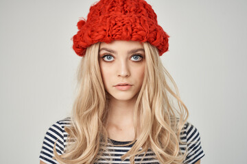 attractive blonde in a red hat attractive look close-up