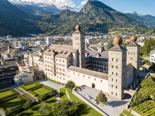 Aerial view of the Stockalper Palace in Brig-Glis, Switzerland. Built in baroque style between 1651 and 1671, it is a Swiss heritage site of national significance. - obrazy, fototapety, plakaty