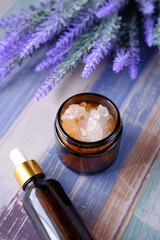 Obraz na płótnie Canvas Herbal Lavender Salt And Essential Oil On Table 
