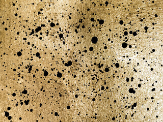 Ink black blots grunge urban on golden background. Vector