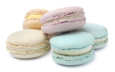 Different delicious colorful macarons on white background