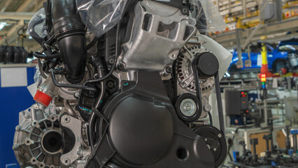 The engine on tray in the car factory. Newly manufactured engine on the production line in a factory concept. Industrial concept.