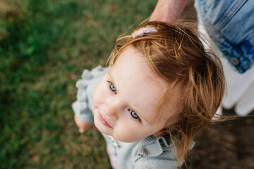 Portrait of toddler girl in casual clothes outdoor