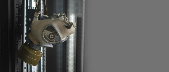 Banner view of the hanging gas mask.