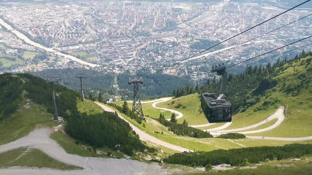 Nordkette Cable Car moving down in Innsbruck, Tyrol, Austria.