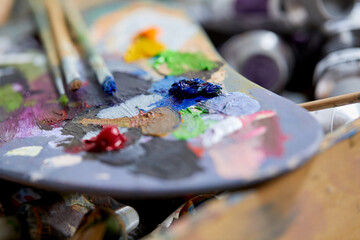 Row of artist paint brushes closeup
