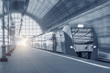 Highspeed train moves fast along the platform.