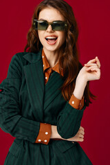 attractive brunette wearing sunglasses suit fashion isolated background