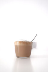 Foamy latte coffee on white background