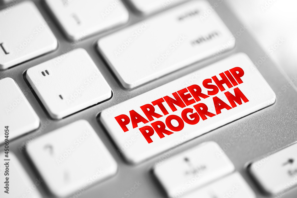 Aufkleber partnership program text button on keyboard, concept background.