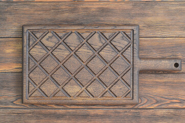 textured wooden cutting board top view with space for text, wooden texture of aged wood or food background with space for text