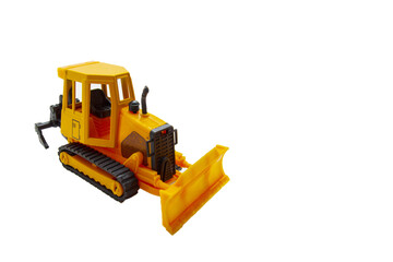 Isolated toy bulldozer tractor