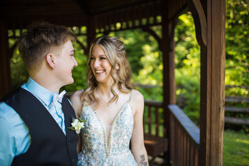 Young couple smiling, looking into each others eyes