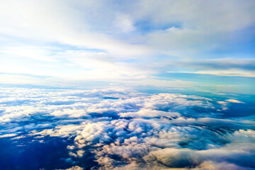 Magical view from the height of a flying plane, beautiful sky, background.