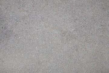 Abstract background of old cobblestone pavement close-up..