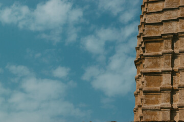 Scenic view of a temple of Khajuraho on blue sky background in India