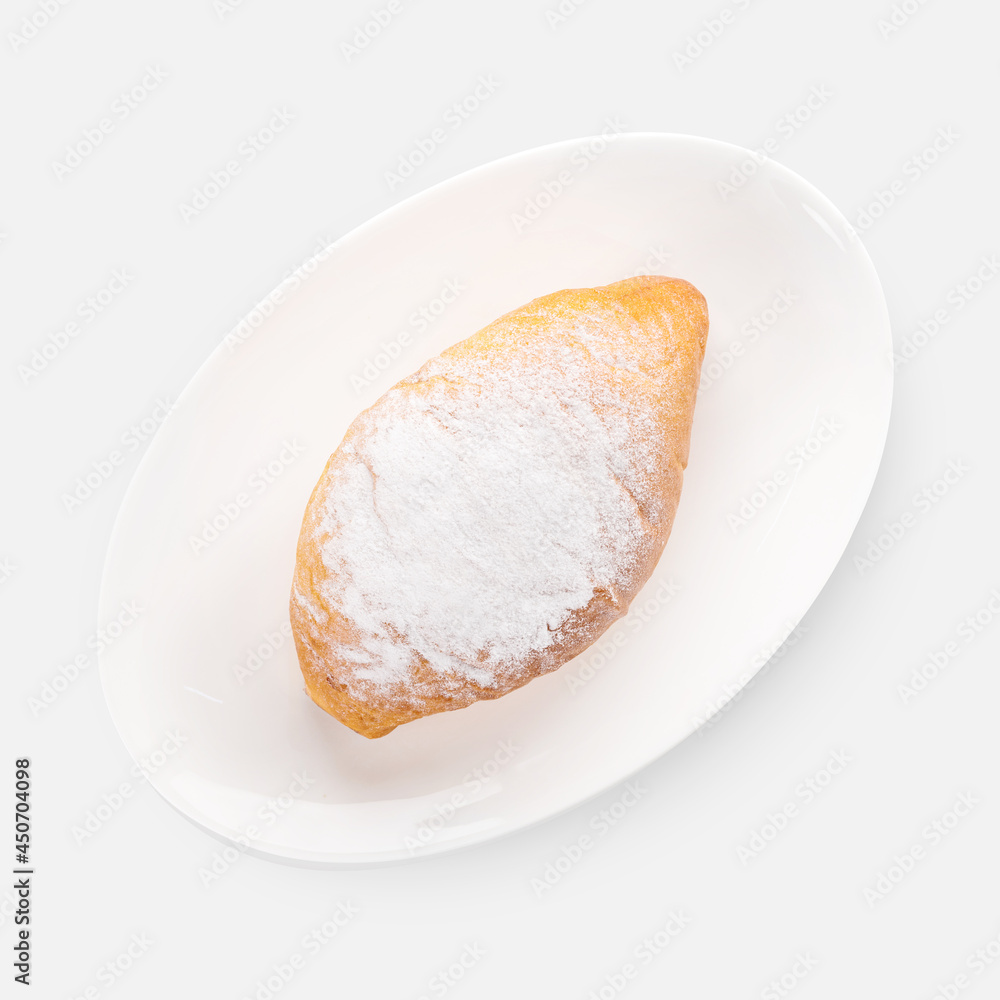 Wall mural sweet fresh buns with powdered sugar on white background