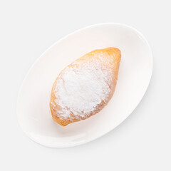 sweet fresh buns with powdered sugar on white background