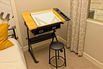 Small Drafting Table In Corner Of Bedroom