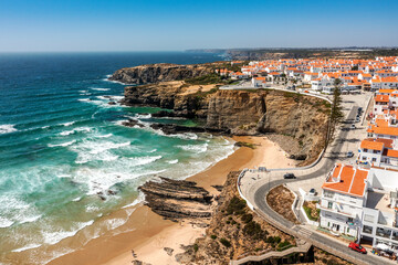 Aerial view of Zambujeira do Mar - charming town on cliffs by the Atlantic Ocean in Portugal