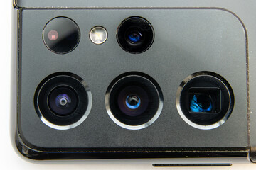 Smartphone Photography, optical and lens concept. Close up of Camera assembly on modern smartphone reveal multiple camera with different focal length for adaptive zooming.