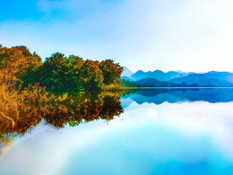 landscape with lake surrounded by beautiful mountain ranges 