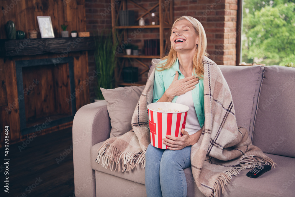 Poster portrait photo woman watching comedy movie at home eating pop corn laughing spanding free time