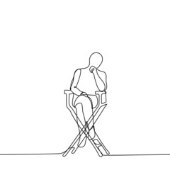 man sits on a high wooden chair - one line drawing. concept director sits in a folding director's chair and observes or reflects