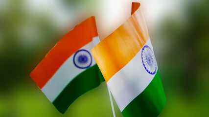 Two Indian tricolor national flags in nature background. Independence Day and Republic Day of...